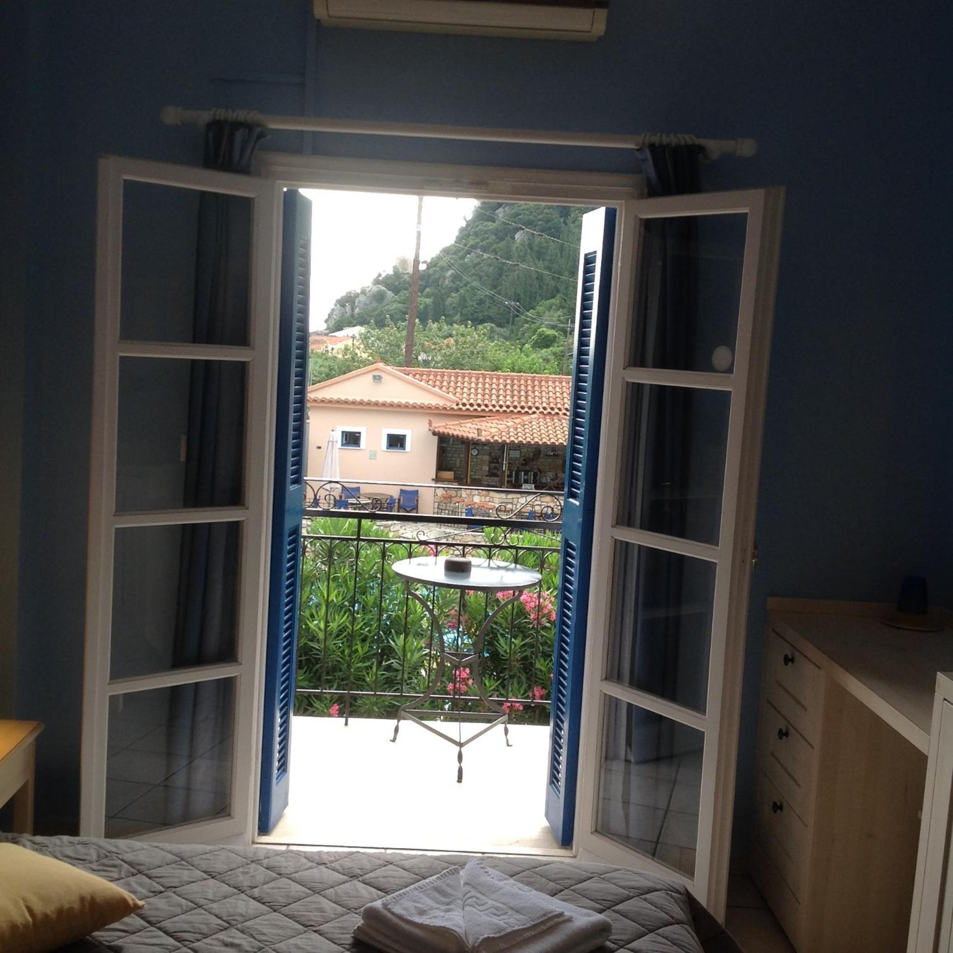 Hotel Nostos Frikes Habitación foto